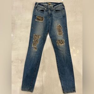 True religion  sequin ripped jeans.No stretch but super comfortable.